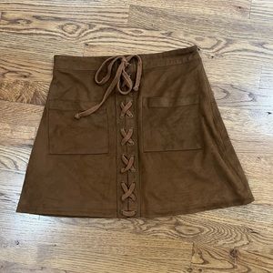 Suede-like tan skirt, zip-up with faux lace-up front, size 29